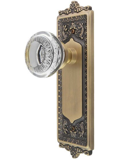 Egg and Dart Style Door Set with Ovolo Crystal-Glass Knobs in Antique Brass.